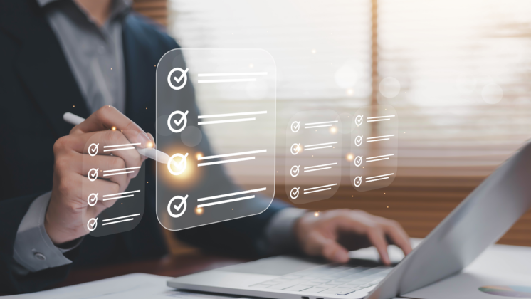 Professional reviewing a digital checklist representing the choice between Asset Management Masterclass and Awareness Training.